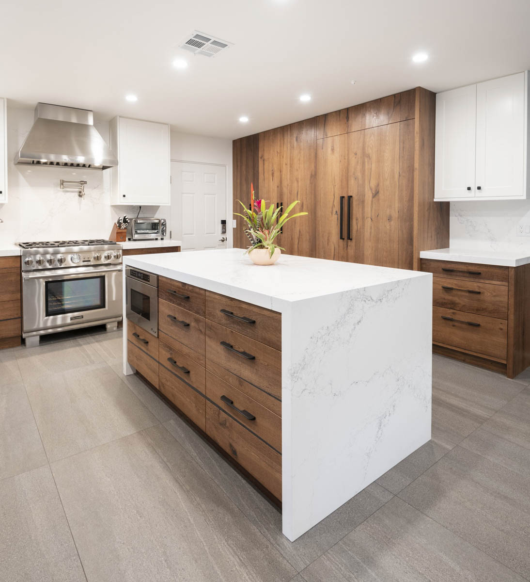 Fitucci Custom Cabinets - Los Angeles - kitchen where everything is built with white marble and custom cabinets. photo is taken closer